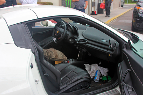 Illustration for article titled Police Find Stolen Ferrari With 'Vomit Caked On The Side' After Alleged Thief Began Asking For Gas Money